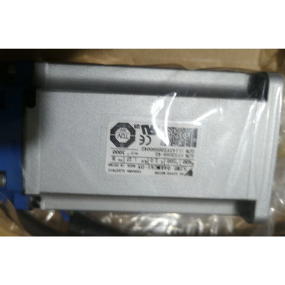 YASKAWA AC Servo Motor SJME-04AMC41-OY. Industrial automation part with serial number and certifications.