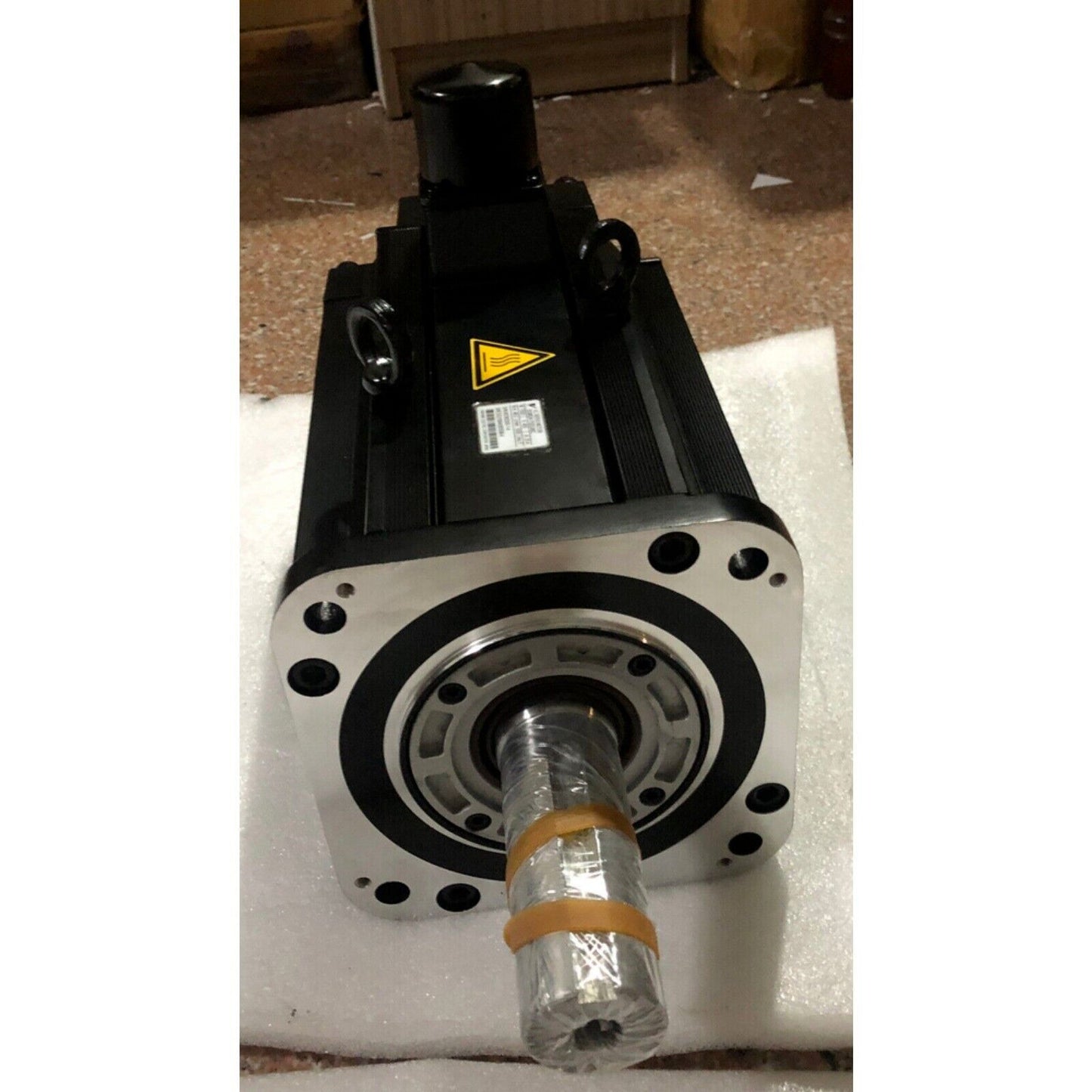 Yaskawa SGMGH-75DCA6C Servo Motor, black industrial motor with silver flange. New SGMGH75DCA6C.