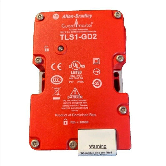 Allen-Bradley Guard Master TLS1-GD2 safety interlock switch, red with warning label, product of Dominican Rep.