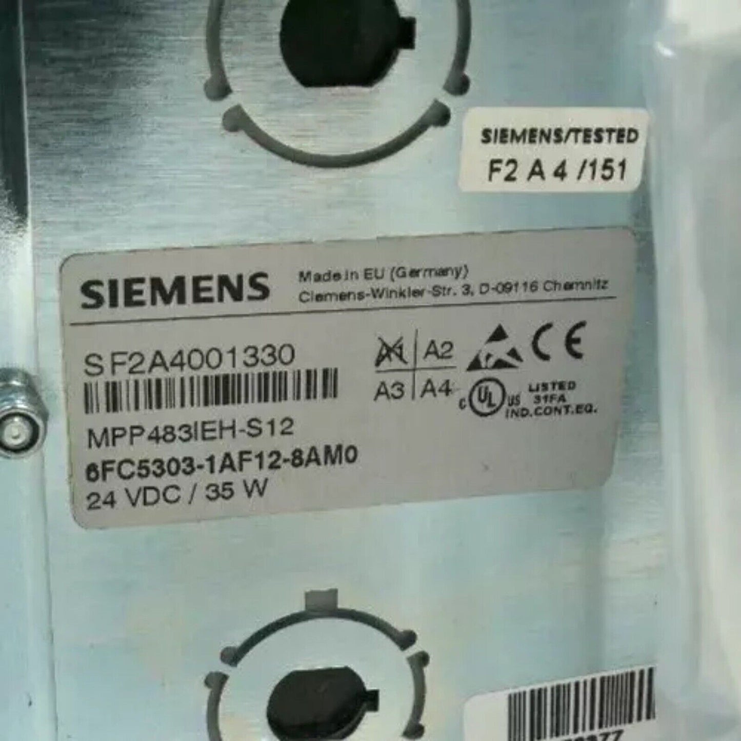 Siemens PLC label with model number 6FC5303-1AF12-8AM0, industrial automation part, Made in Germany