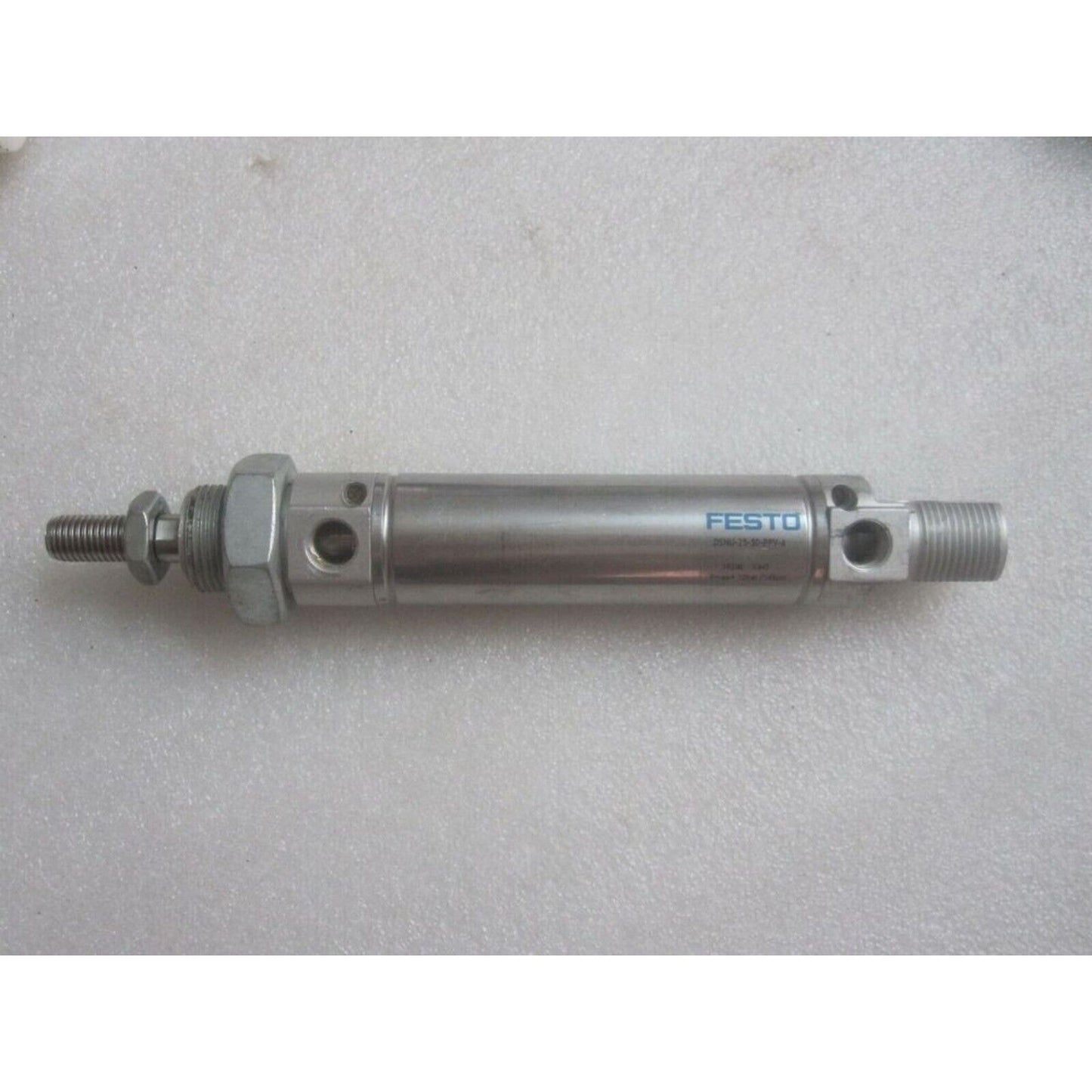 FESTO DSNU-25-50-PPV-A pneumatic cylinder. Stainless steel industrial automation component.