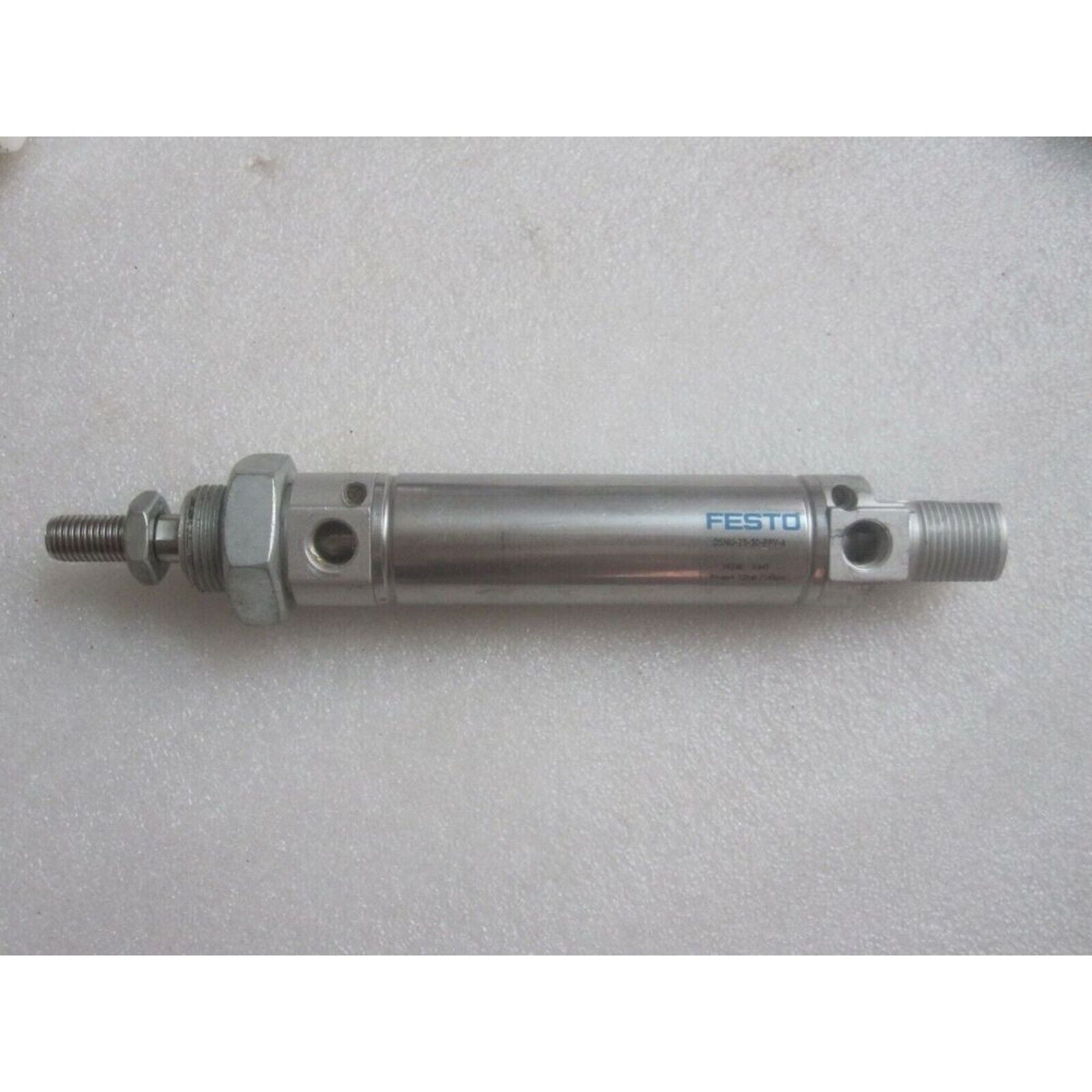 FESTO DSNU-25-50-PPV-A pneumatic cylinder. Stainless steel industrial automation component.