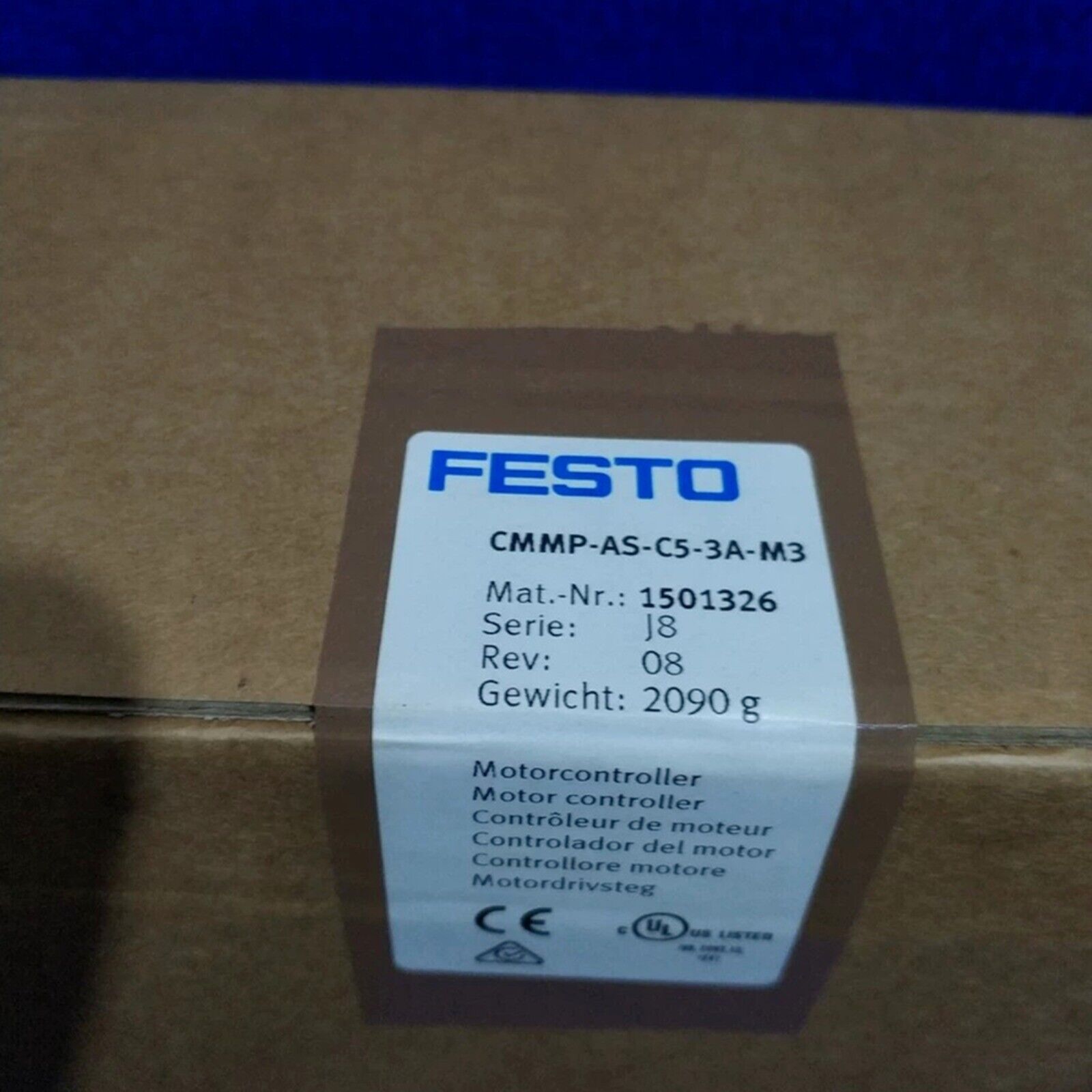Festo CMMP-AS-C5-3A-M3 motor controller on a brown box, industrial automation part