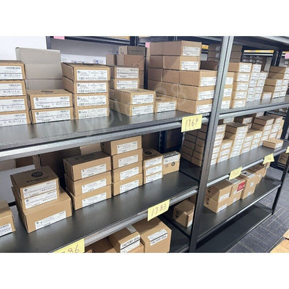 Warehouse stock of Allen-Bradley CompactLogix controllers, ready for shipping.
