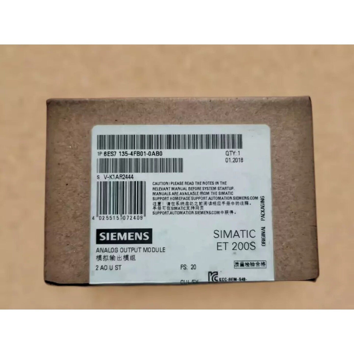 Siemens SIMATIC ET 200S 6ES7135-4FB01-0AB0 Analog Output Module in original packaging, for industrial automation.