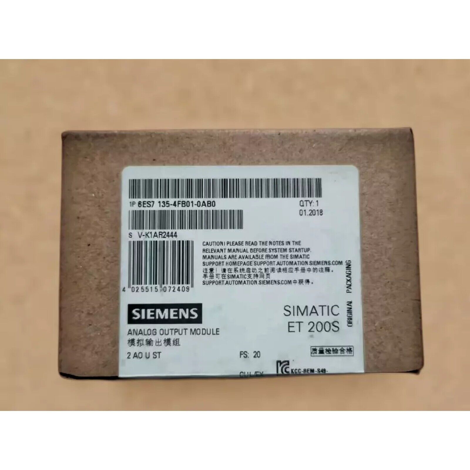 Siemens SIMATIC ET 200S 6ES7135-4FB01-0AB0 Analog Output Module in original packaging, for industrial automation.