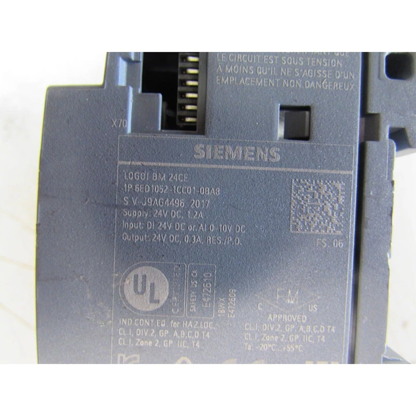 Siemens LOGO! 24CE logic module detail view. Model 6ED1052-1CC01-0BA8, industrial automation PLC part.