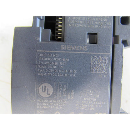 Siemens LOGO! 24CE logic module detail view. Model 6ED1052-1CC01-0BA8, industrial automation PLC part.