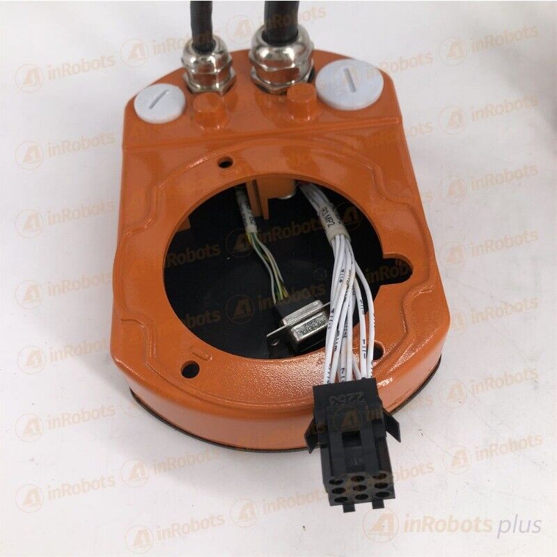 ABB IRB2400 robot body cable component. Orange housing with connectors and cables, industrial automation part.