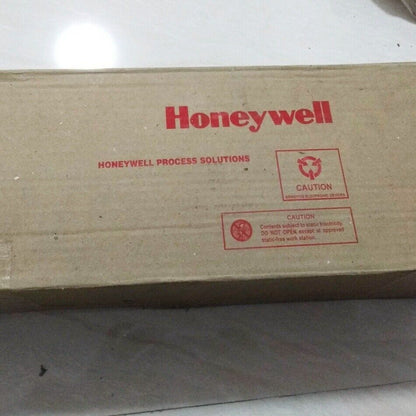 Honeywell process solutions packaging box with caution labels for sensitive electronic devices.