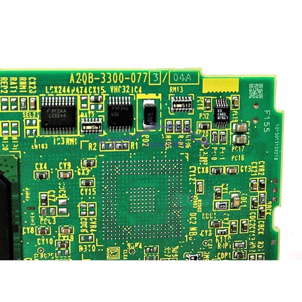 FANUC A20B-3300-0773 Circuit Board - Green PCB with electronic components.