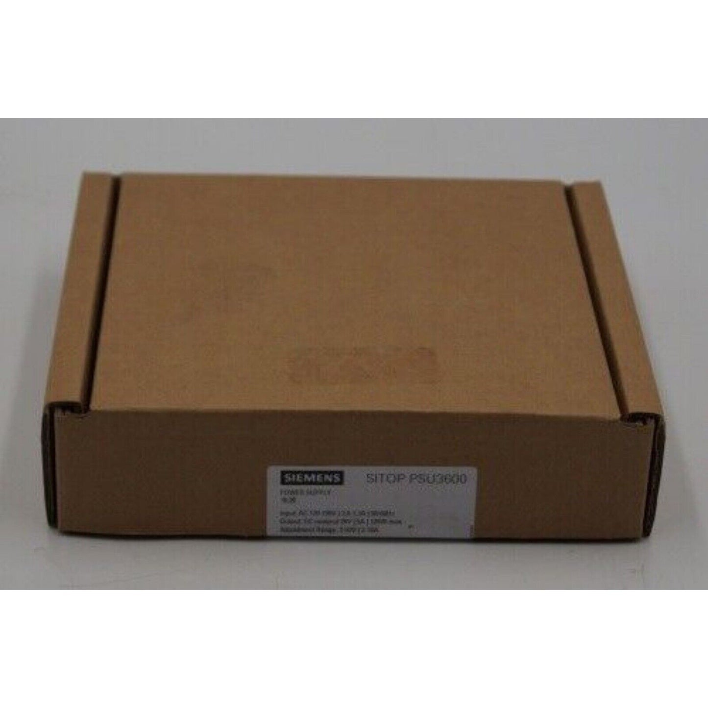 Siemens SITOP PSU3600 power supply unit in brown cardboard box. Industrial automation part.