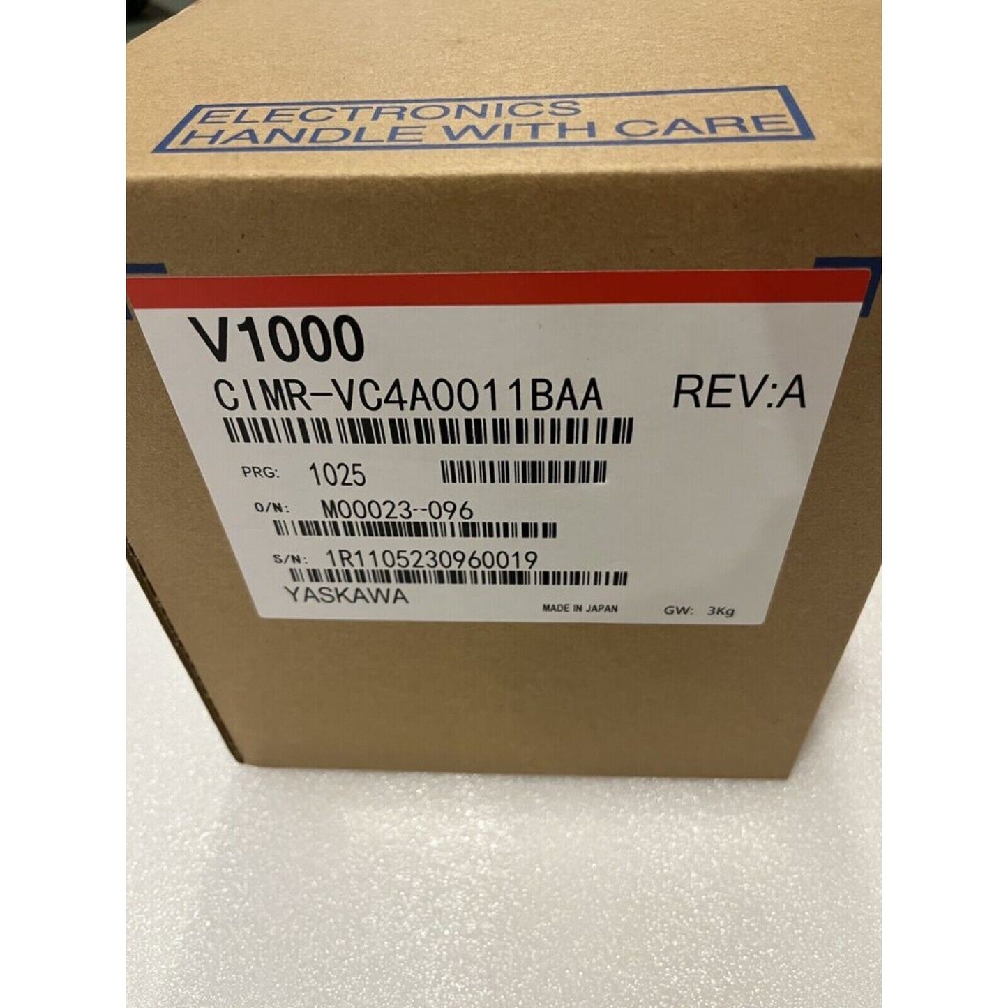 YASKAWA V1000 Series CIMR-VC4A0011BAA Inverter in cardboard box, industrial automation part.