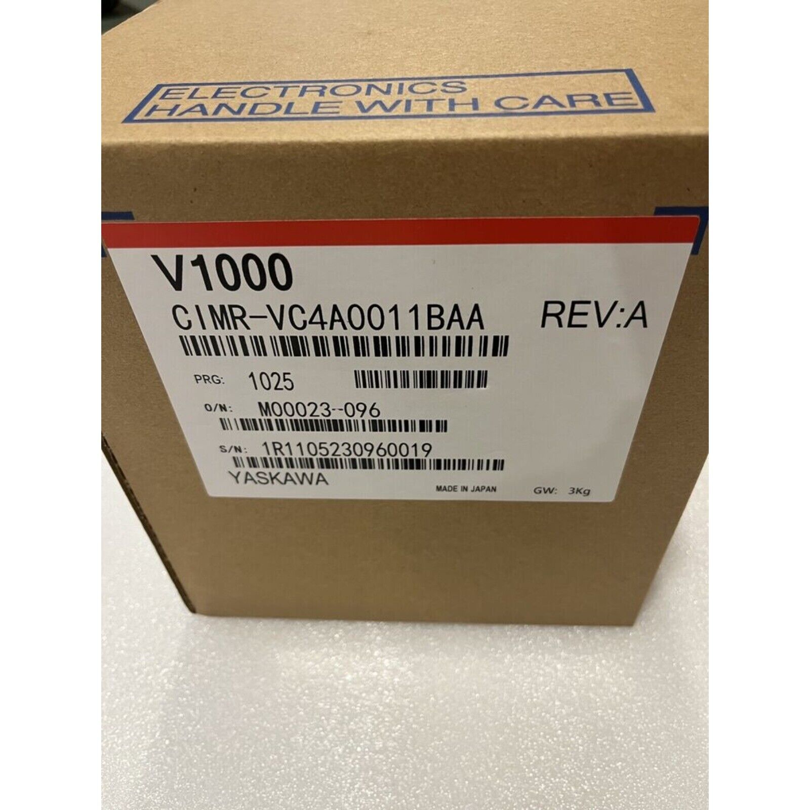 YASKAWA V1000 Series CIMR-VC4A0011BAA Inverter in cardboard box, industrial automation part.