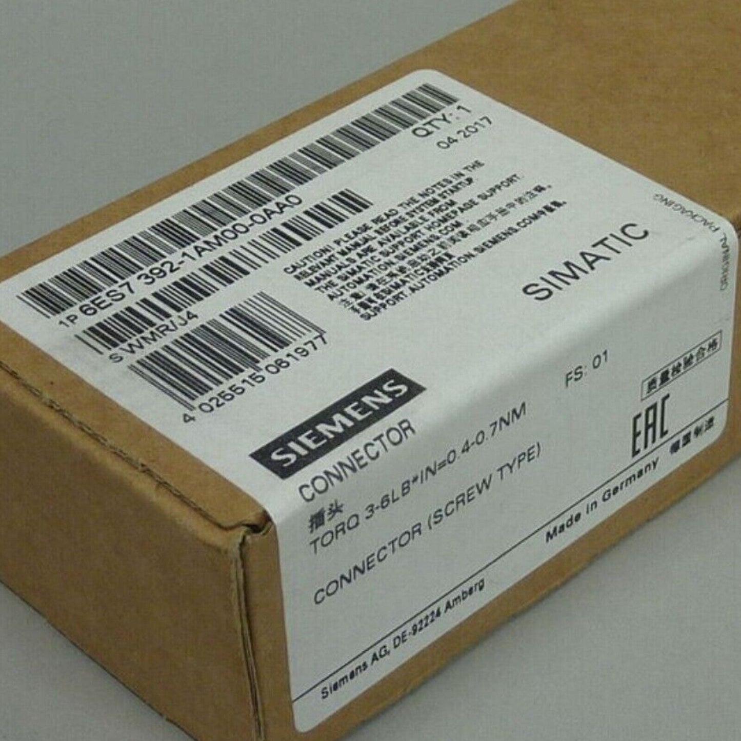 Siemens SIMATIC S7-300 connector in packaging, part number 6ES7 392-1AM00-0AA0, industrial automation equipment.