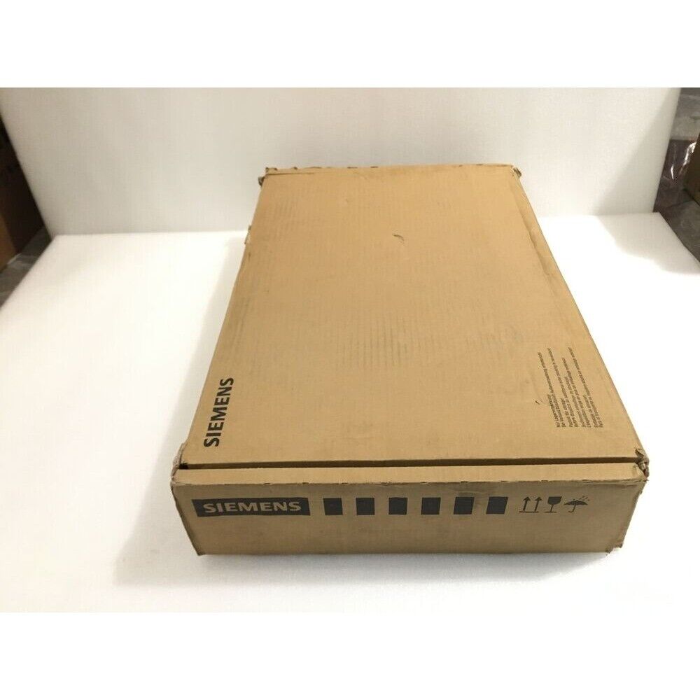 Siemens SINAMICS S120 drive box in packaging, featuring the Siemens logo and important handling symbols.