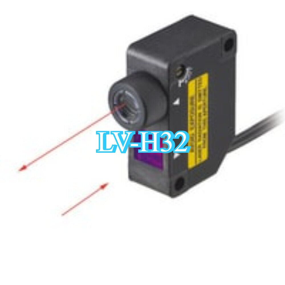 KEYENCE LV-H32 Laser Sensor, industrial automation equipment with laser beam.