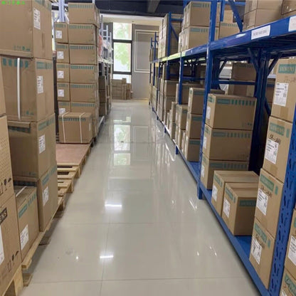 Warehouse storage of Siemens automation parts, boxes on shelves