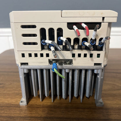Yaskawa CIMR-JU4A0011BAA variable frequency drive wiring, industrial automation. Labeled terminals and connected wires.