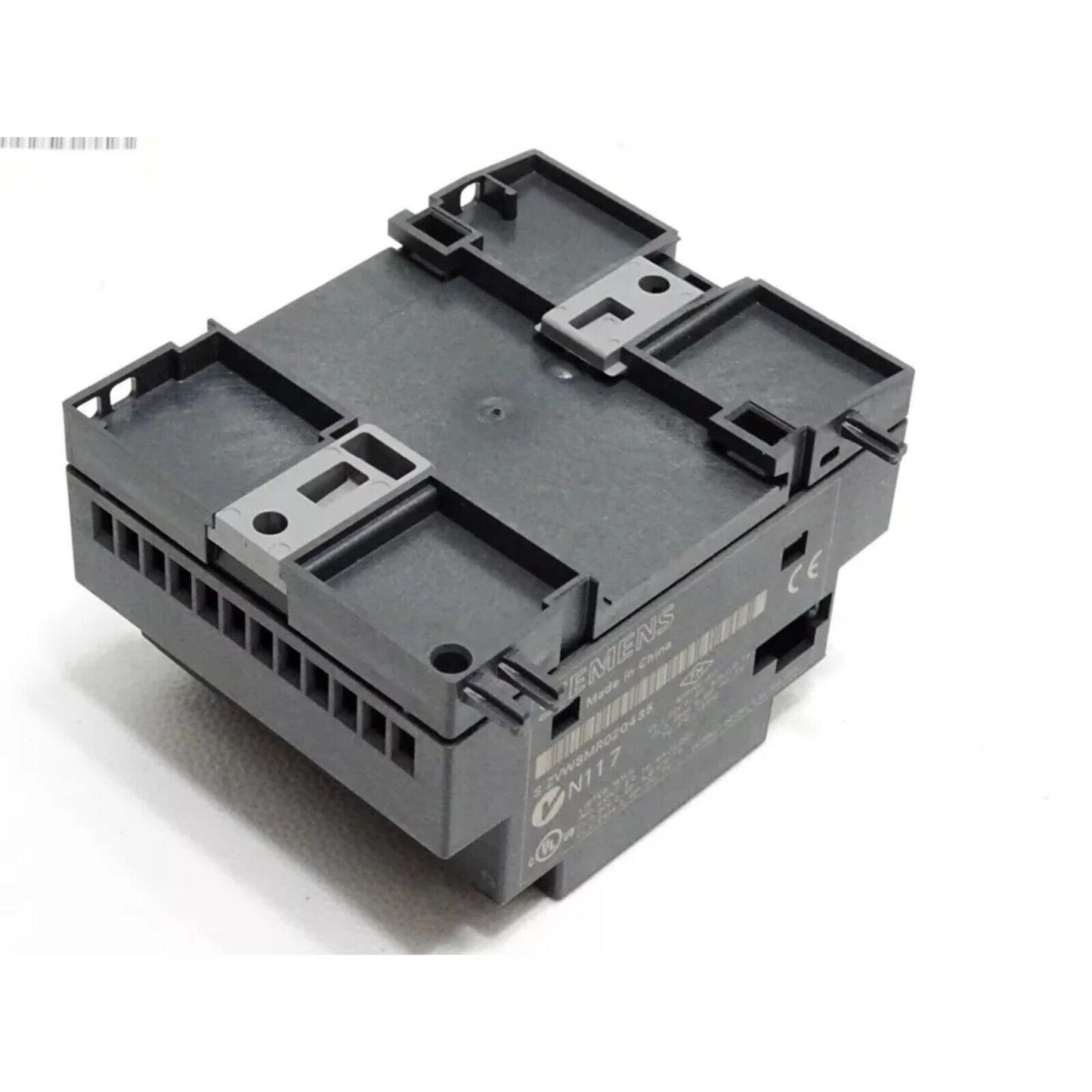 Siemens SINAMICS G120 DM16 24 expansion module, gray industrial automation part with text.