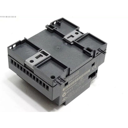 Siemens SINAMICS G120 DM16 24 expansion module, gray industrial automation part with text.