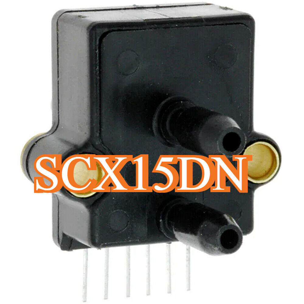 Honeywell SCX15DN Power Module Supply - Black industrial sensor with brass accents and outlet tubes.