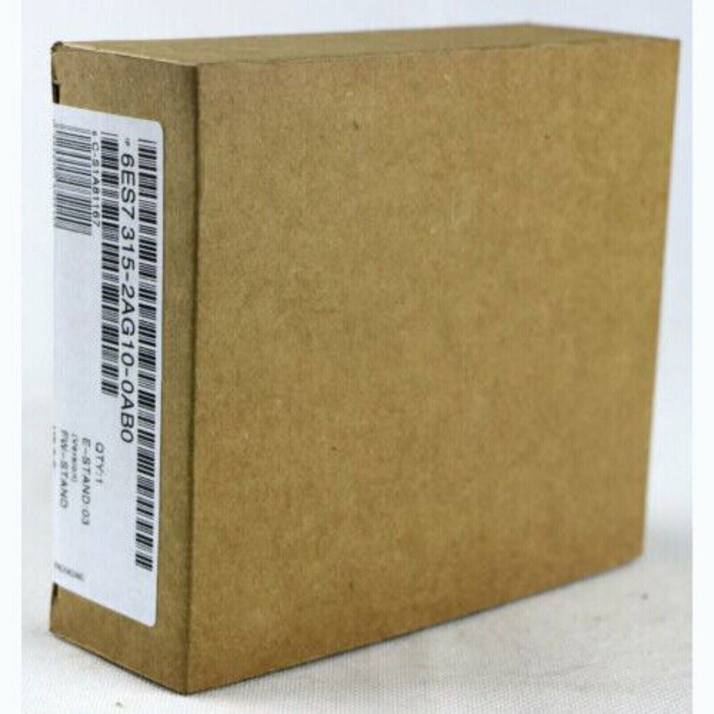 Siemens S7-300 CPU module in cardboard box. Product code 6ES7 315-2AG10-0AB0, industrial automation part.