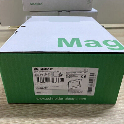 Schneider Electric HMIGXU3512 HMI panel box, green and white packaging, product label visible.