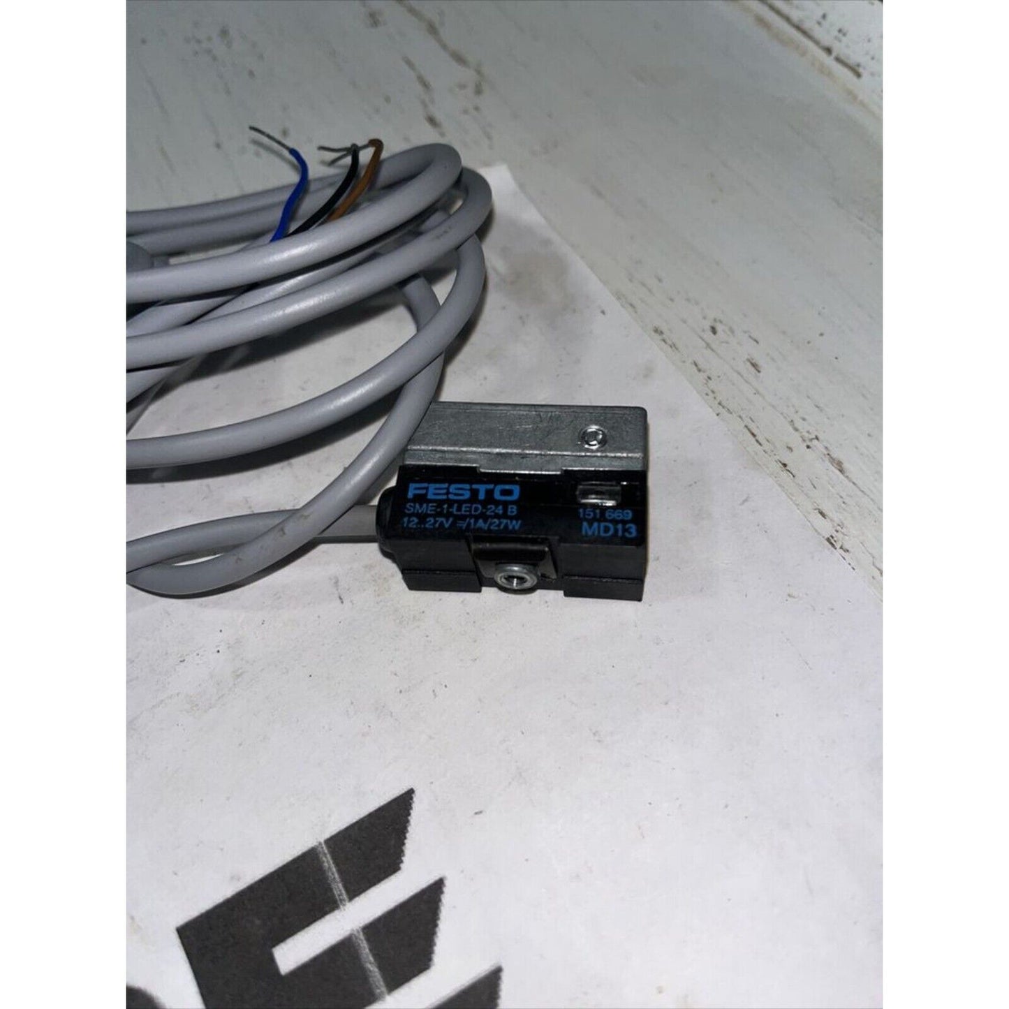 Festo SME-1-LED-24-B proximity sensor switch with cable, industrial automation component.
