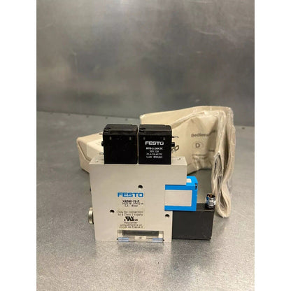 FESTO VADMI-70-P vacuum generator, industrial automation part. Features a Class 2 supply connection.