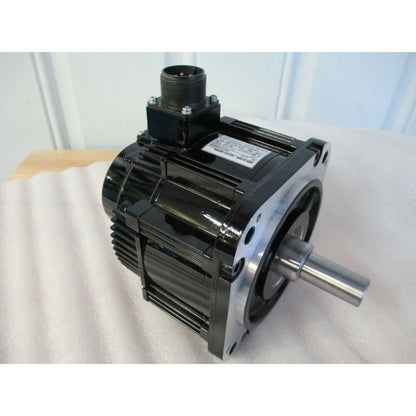 YASKAWA SGMGV-09A3A21 servo motor, black and silver industrial automation part. Servo motor for sale.