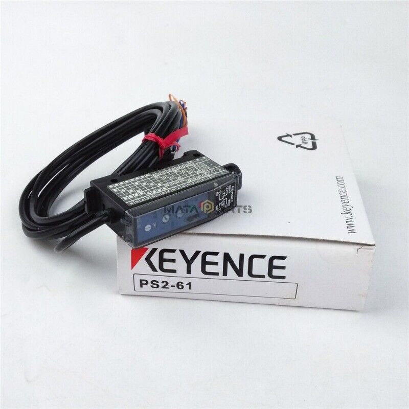 Keyence PS2-61 photoelectric sensor with black cable and box. Industrial automation part.