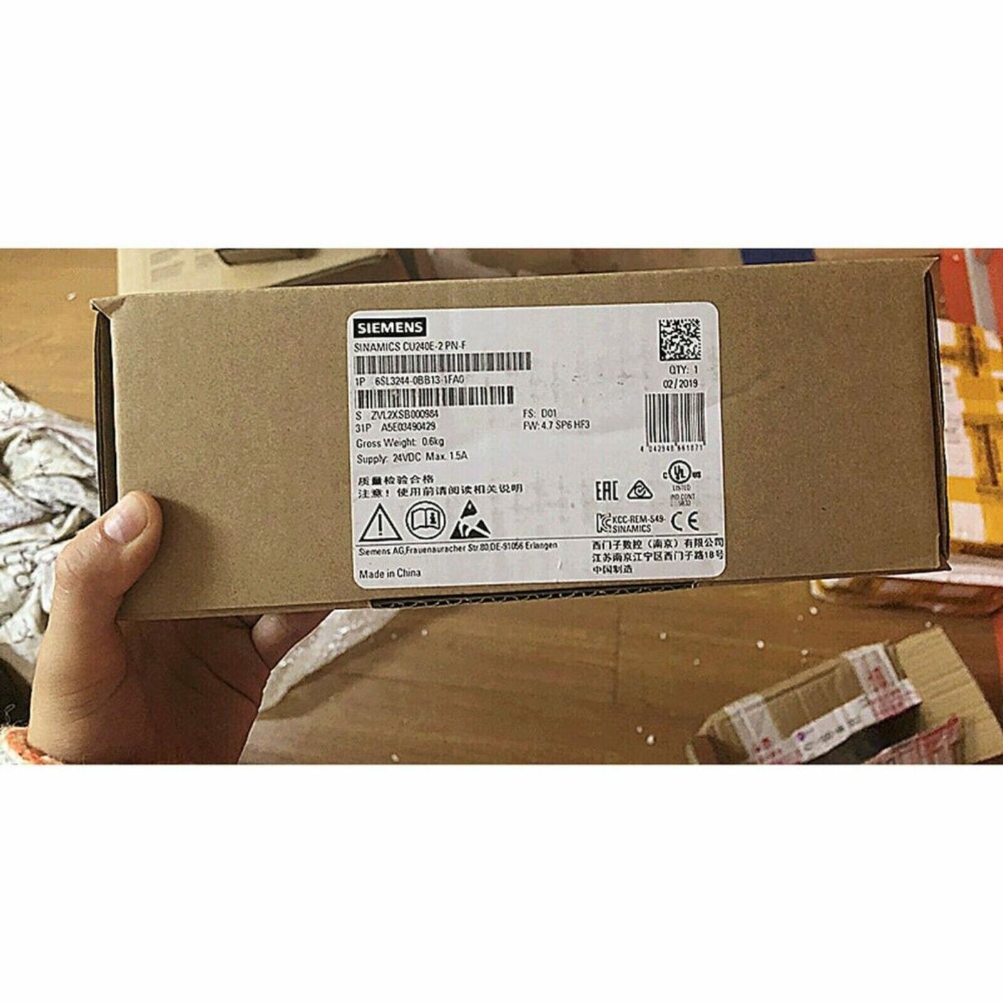 Siemens SINAMICS CU240E-2 PN-F drive box, 6SL3244-0BB13-1FA0, with labels and product information.