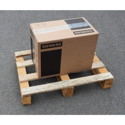 Siemens industrial automation equipment box on wooden pallet. Industrial parts.