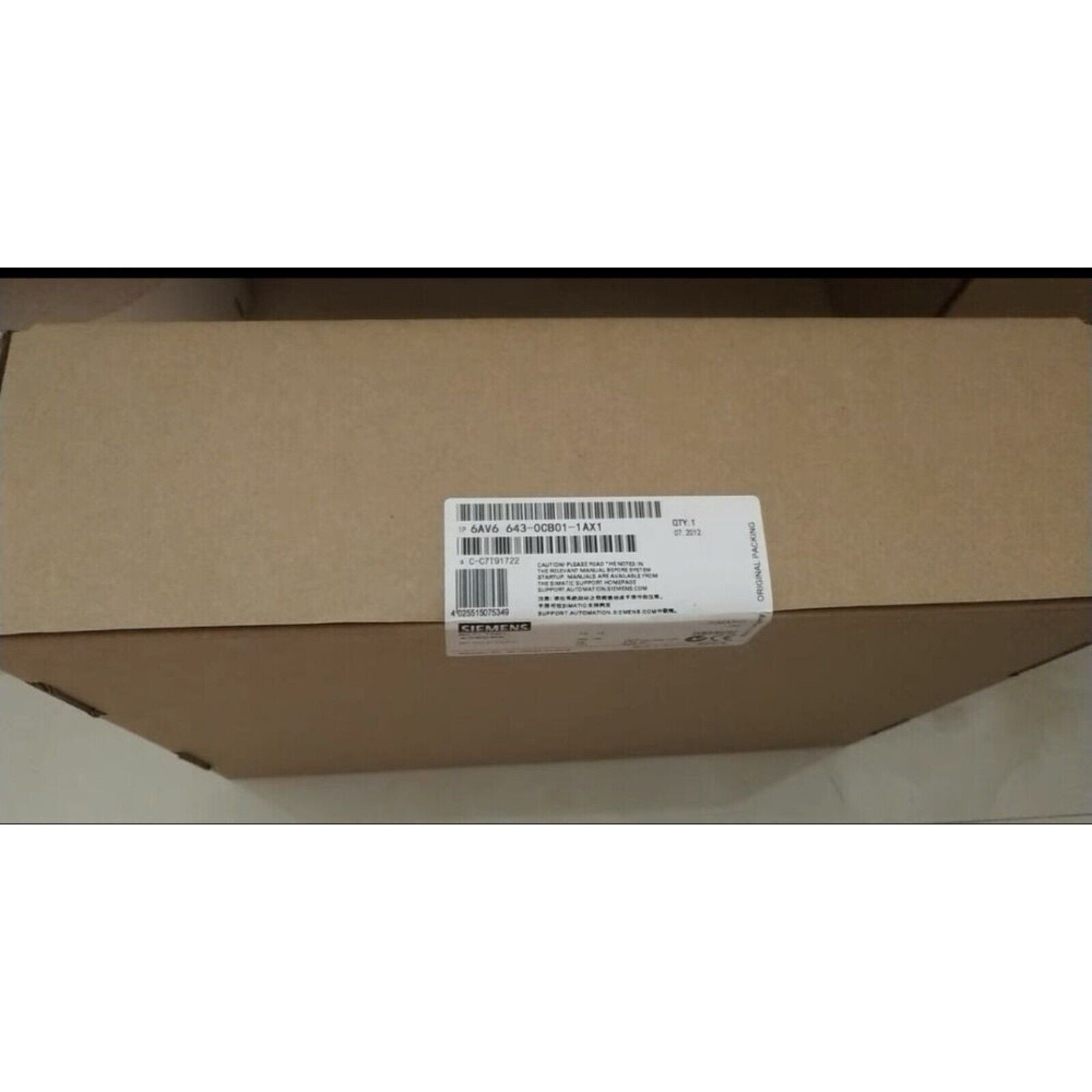 Siemens SIMATIC MP 277 8" Panel in original packaging, part number 6AV6 643-0CB01-1AX1, industrial automation component.