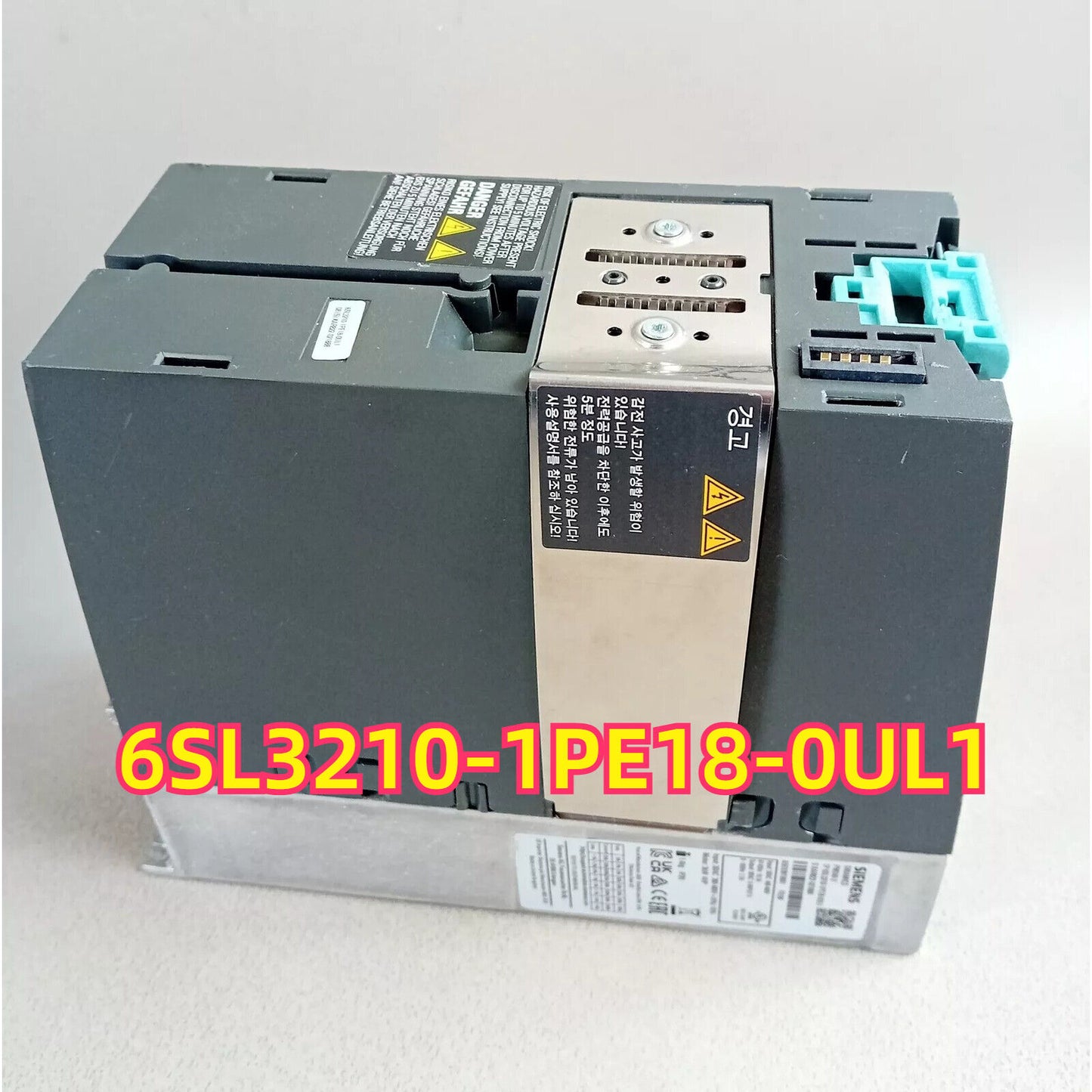 Siemens SINAMICS PM240-2 Power Module 6SL3210-1PE18-0UL1, industrial automation part, with safety warnings.