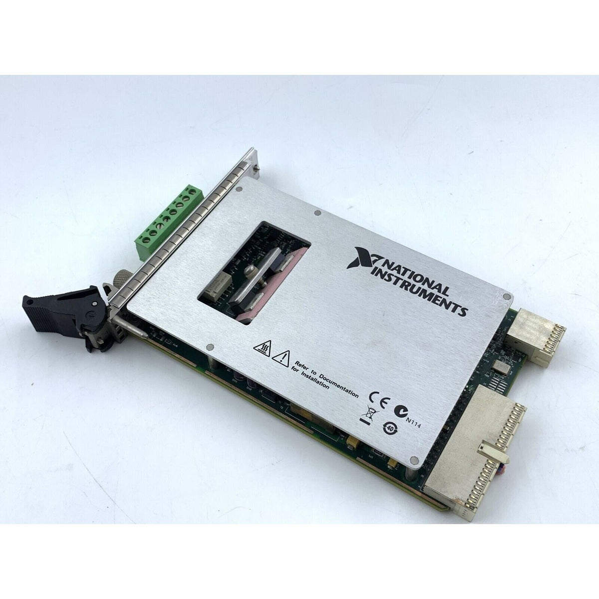 National Instruments PXI-4132 SMU Module, silver metal component with green connectors, electronics.