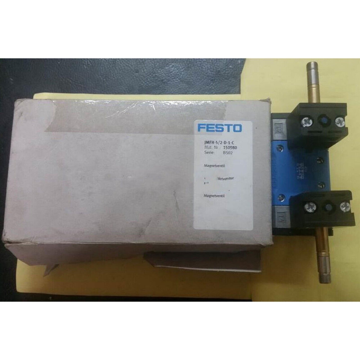 Festo JMFH-5/2-D-1-C Solenoid valve with box and product details. Pneumatic automation component for industrial use.