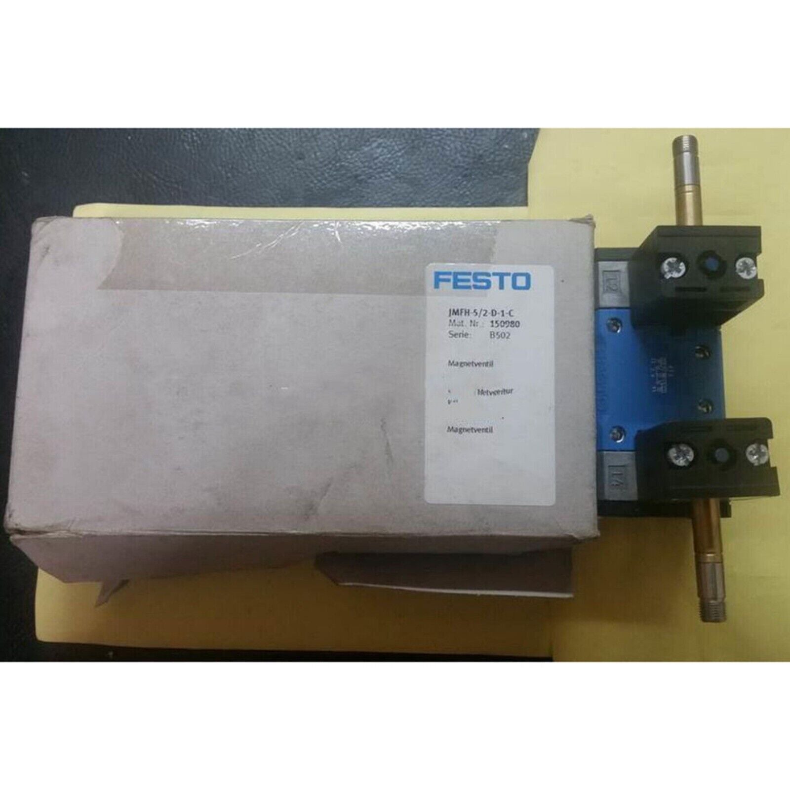 Festo JMFH-5/2-D-1-C Solenoid valve with box and product details. Pneumatic automation component for industrial use.