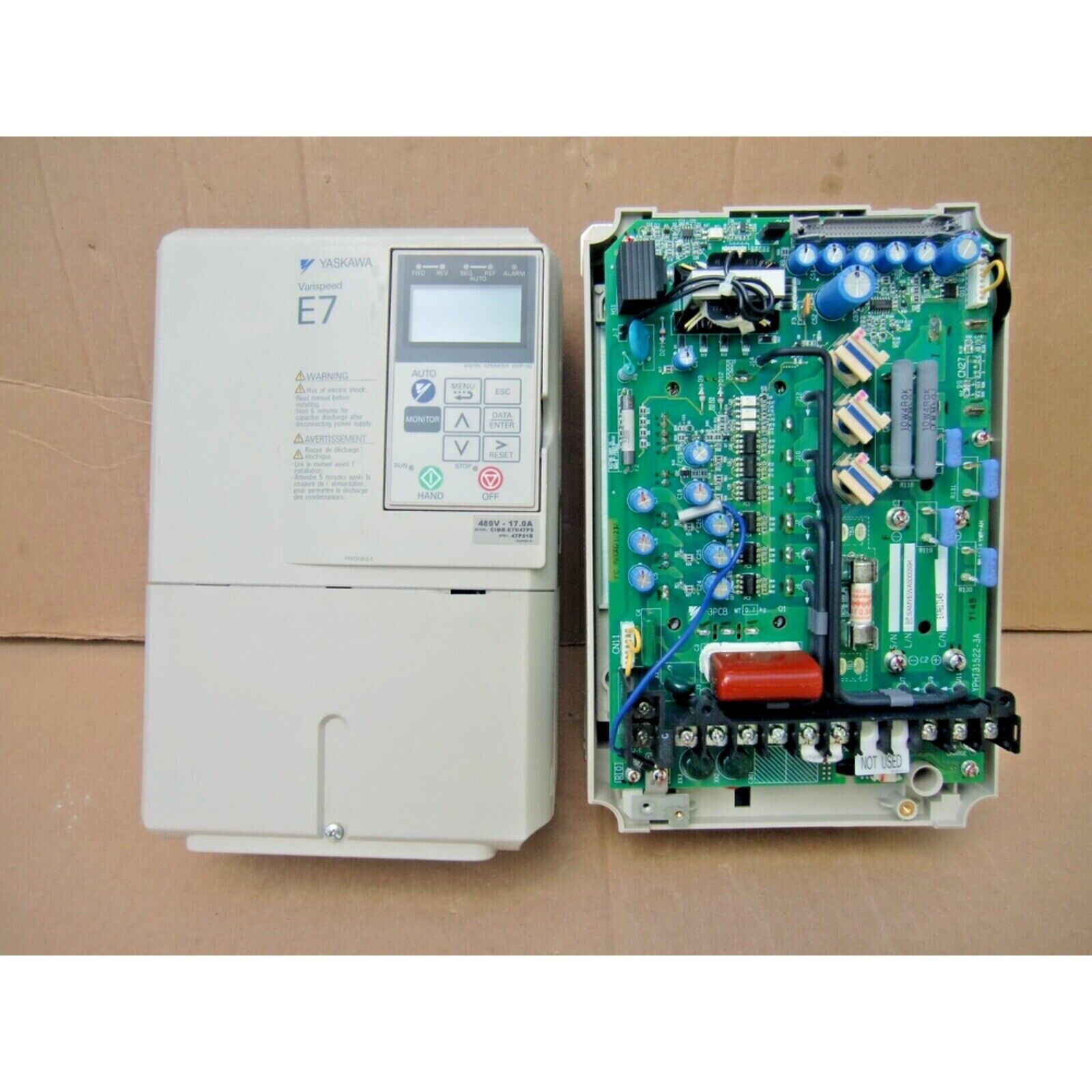 YASKAWA E7 AC Drive, internal components visible, 480V 17.0A, industrial automation part with control panel