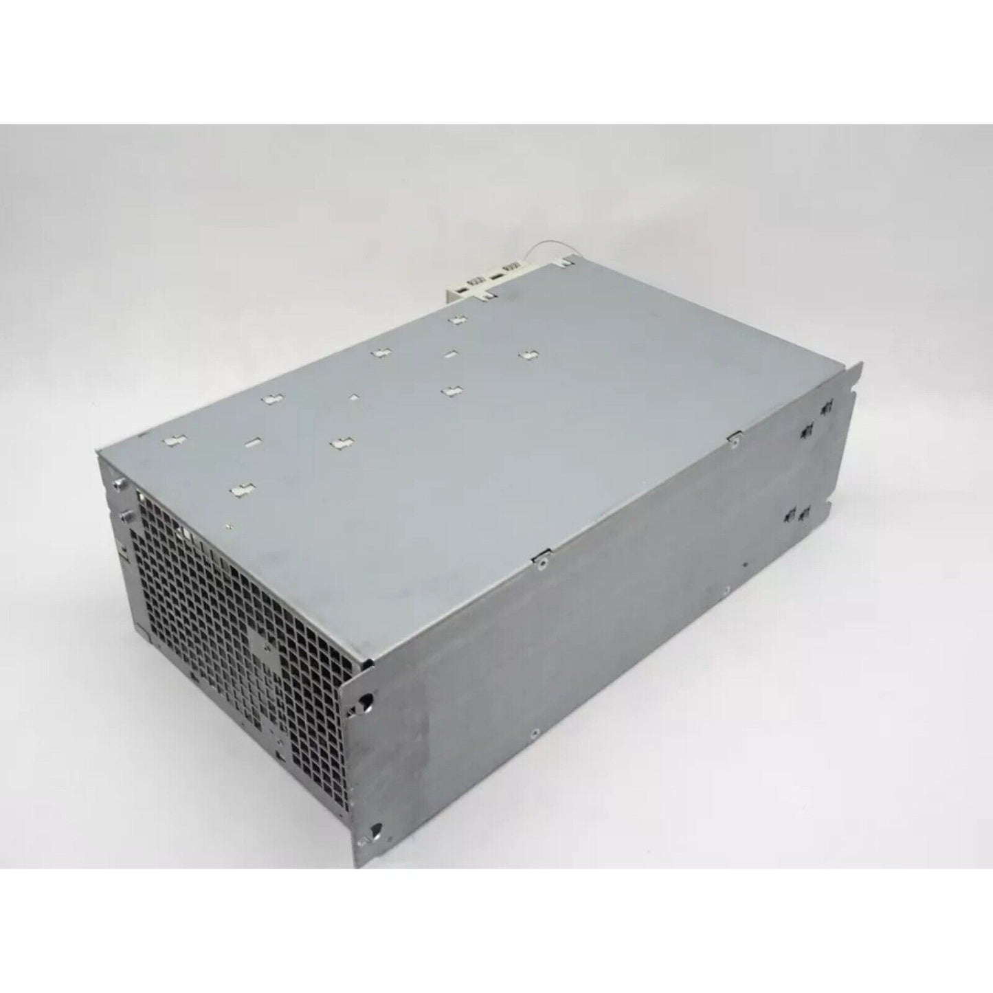 Siemens SIMODRIVE 611 Power Module, industrial automation part. Grey metal enclosure with ventilation grid.
