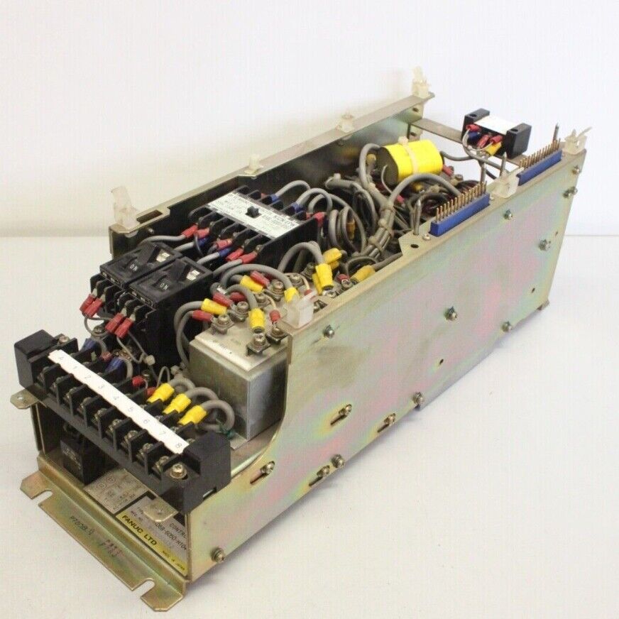FANUC A06B-6050-H104 Velocity Control Unit. Industrial automation spare part with wiring and components.