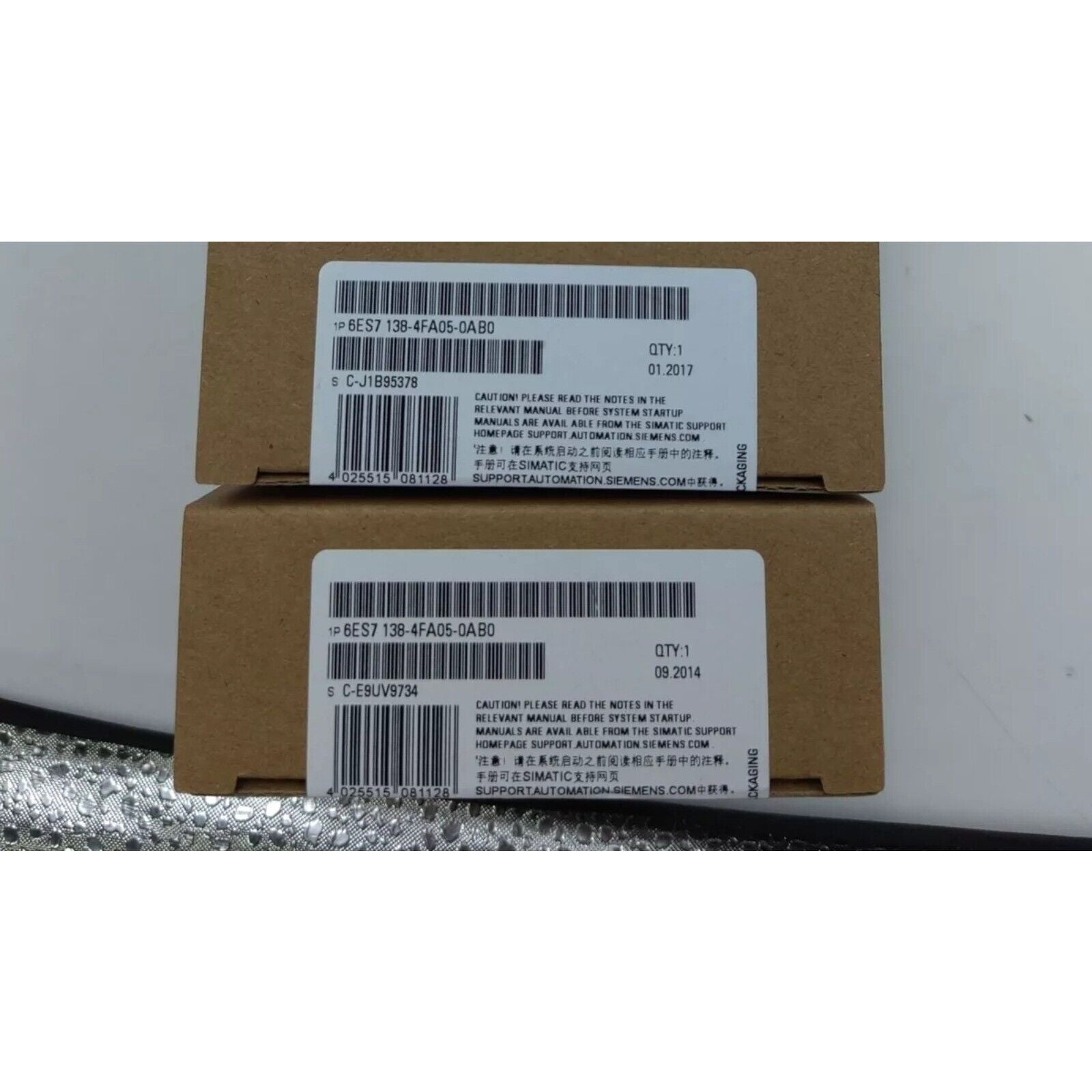 Siemens 6ES7 138-4FA05-0AB0 SIMATIC ET 200S DP ELECTRON Module packaging, featuring product information and caution notices.