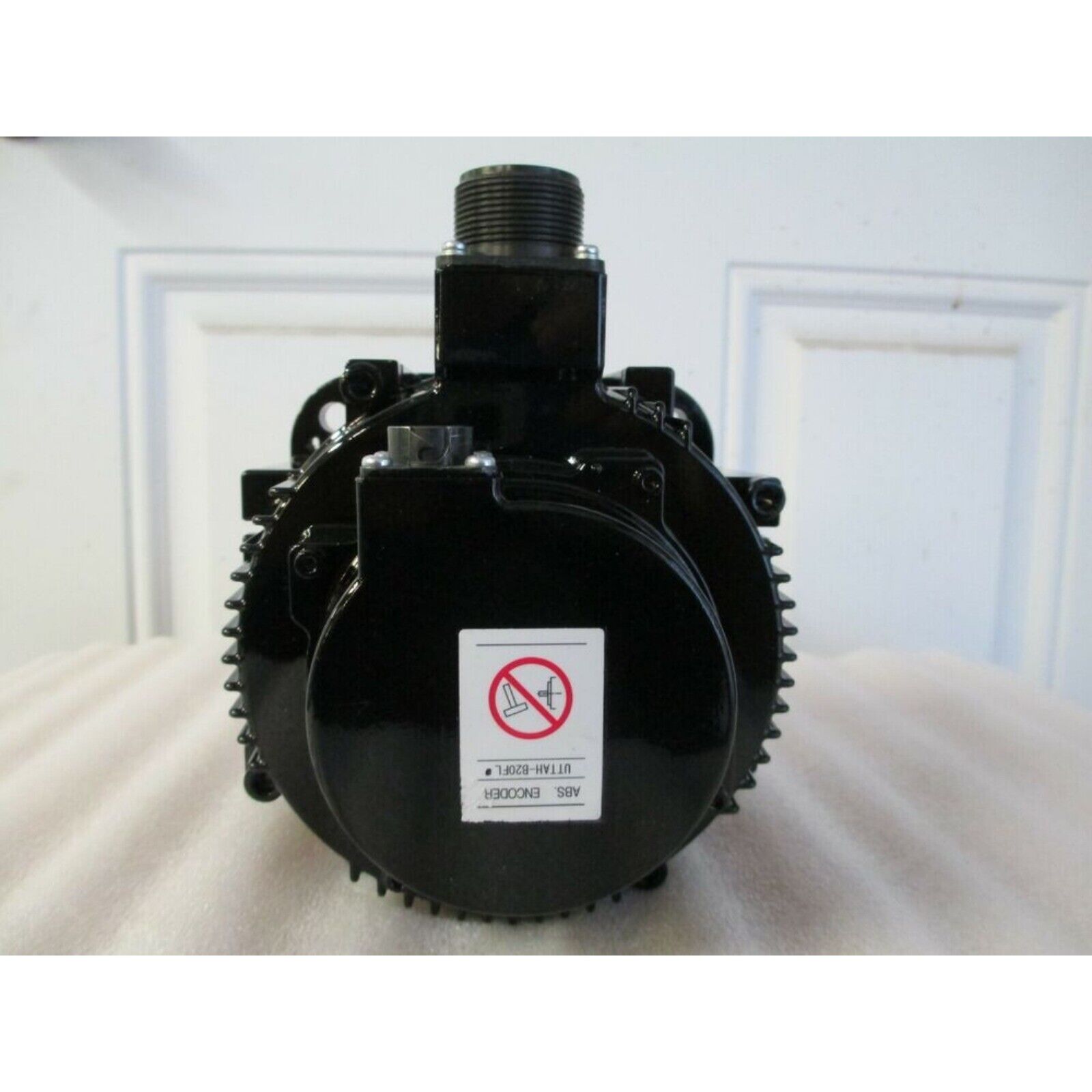 YASKAWA SGMGV-09A3A21 servo motor, black industrial automation equipment. ABS ENCODER, UTAH-B20FL label.