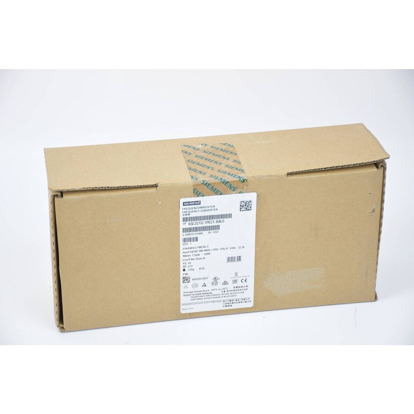 Siemens SINAMICS G120C frequency inverter in a cardboard box, model 6SL3210-1PE21-8AL0, new industrial automation part.