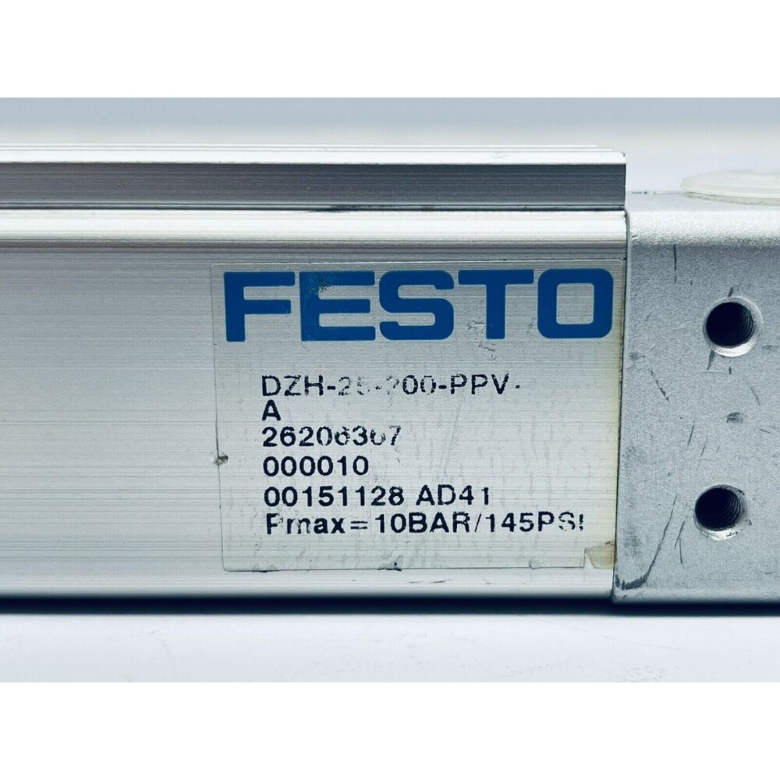 Festo DZH-25-200-PPV-A flat cylinder. Silver pneumatic cylinder with label, industrial automation part.