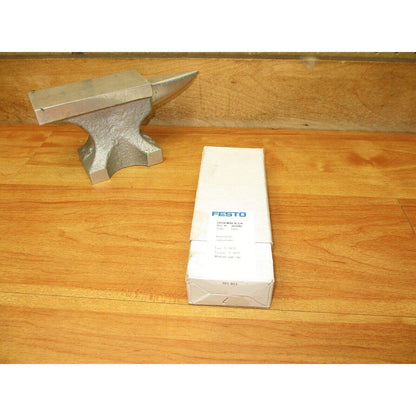 FESTO CPE18-M1H-5J-1/4 Solenoid Valve on wooden surface, industrial automation part, model number 163143