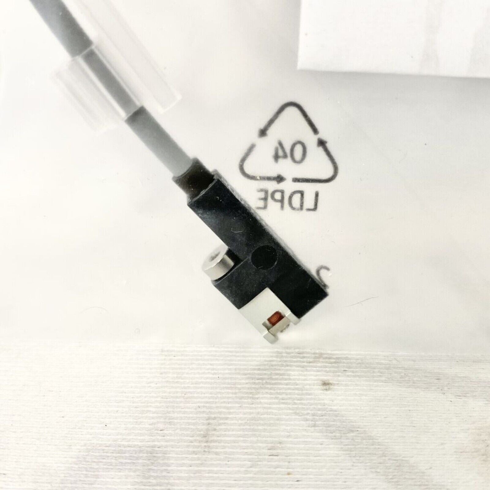 Festo SMT-10G-PS-24V-E-0,3Q-M8D Proximity Sensor. Industrial automation part with cable and connector.