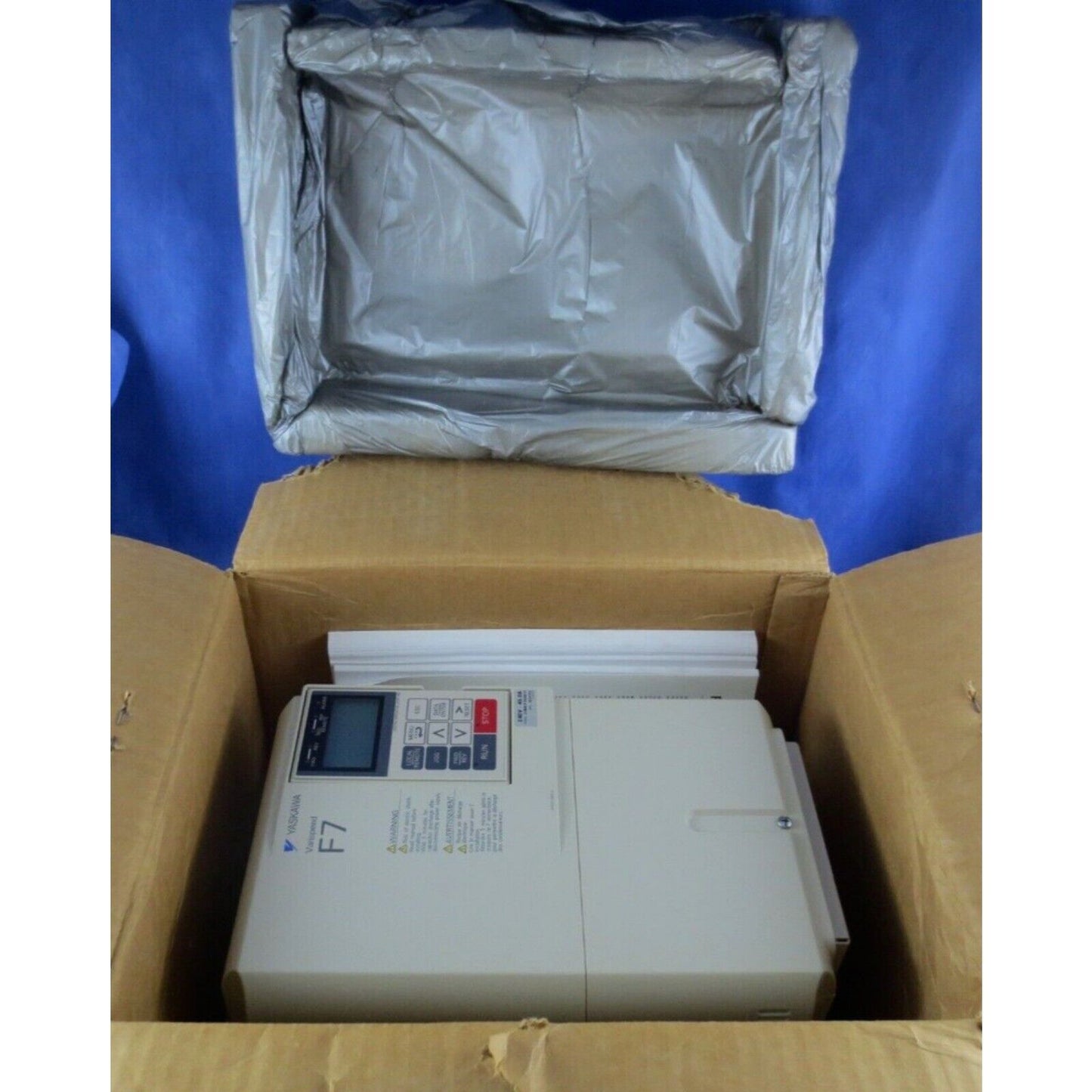 YASKAWA F7 Varispeed AC Drive in box. New in box industrial automation equipment, control panel and labels.
