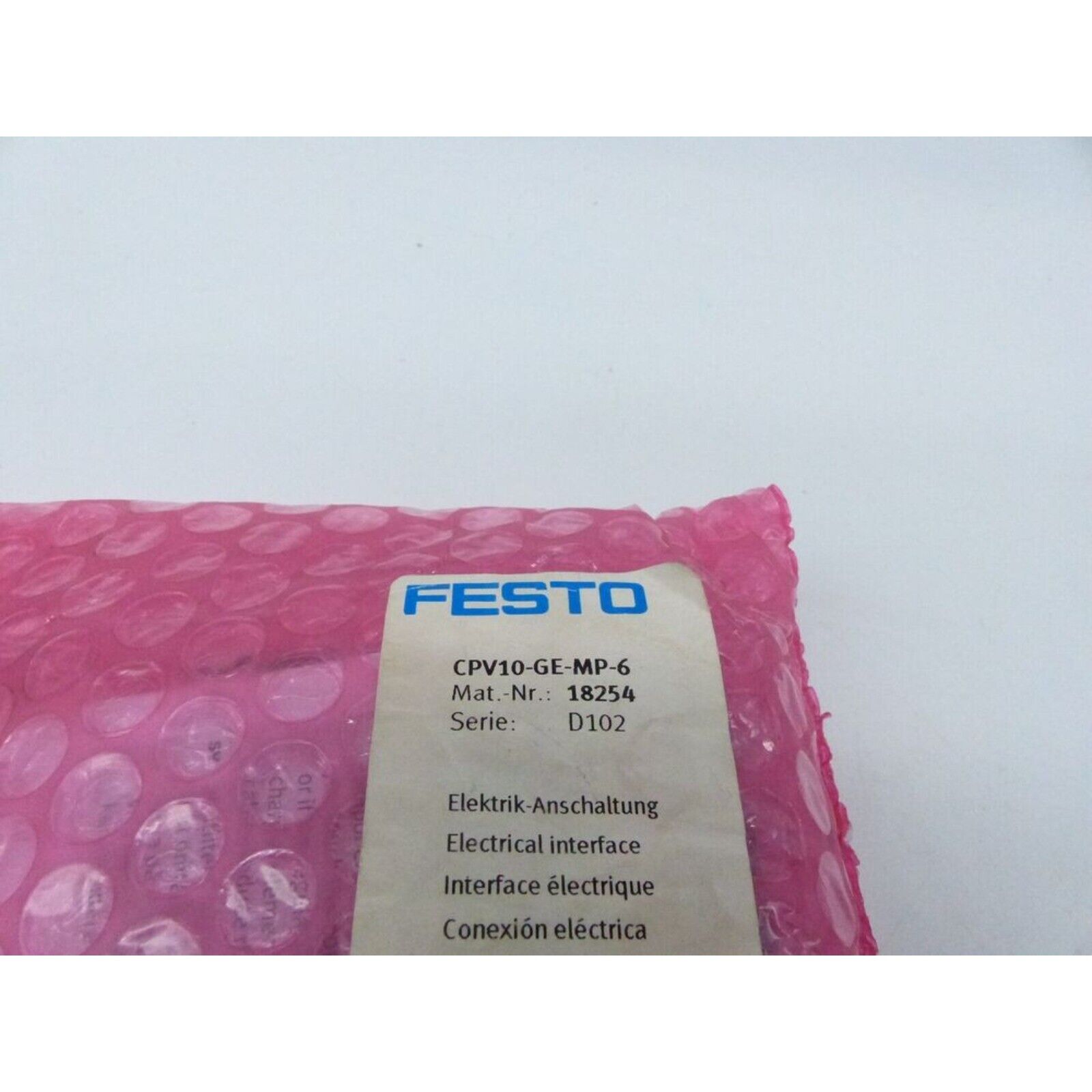 Festo CPV10-GE-MP-6 electrical interface valve in pink bubble wrap packaging. Part number 18254.